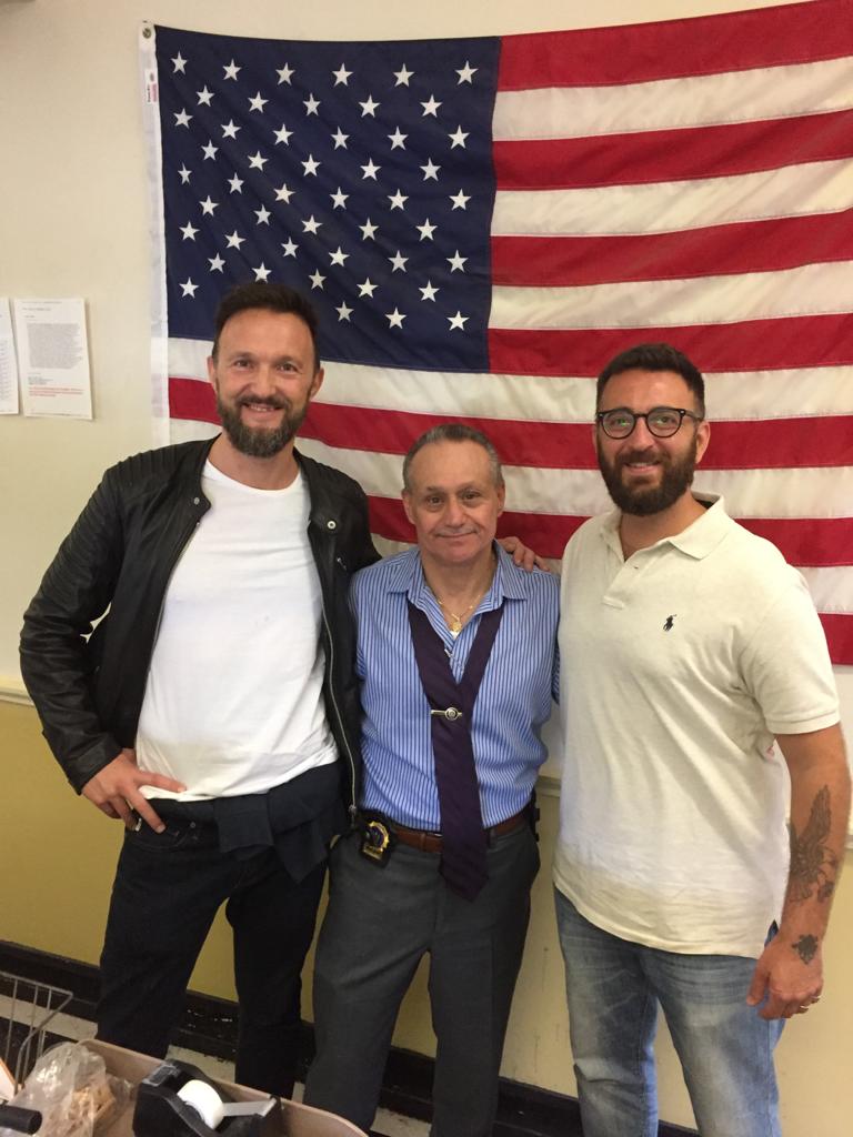 I fondatori di bitCorp, Christian Persurich e Gianluca Tirozzi, con un detective del Dipartimento di Polizia di New York
