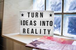 Turn Ideas into Reality! Photo by Mika Baumeister on Unsplash