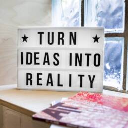 Turn Ideas into Reality! Photo by Mika Baumeister on Unsplash