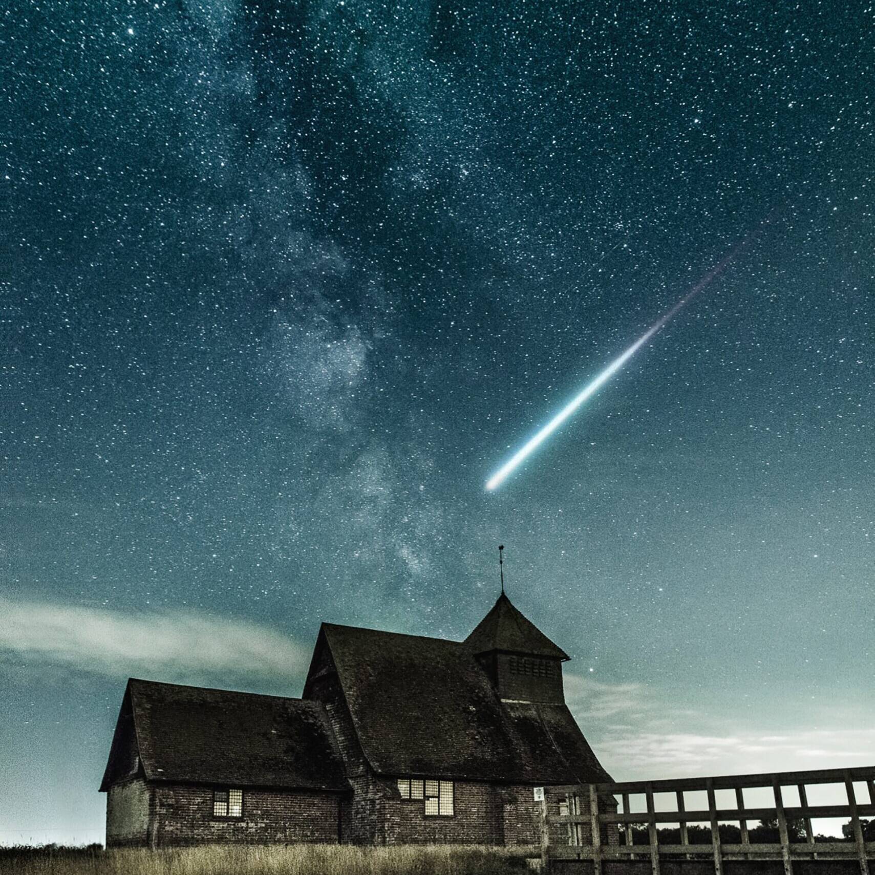 Night sky over the church Photo by Alexander Andrews on Unsplash