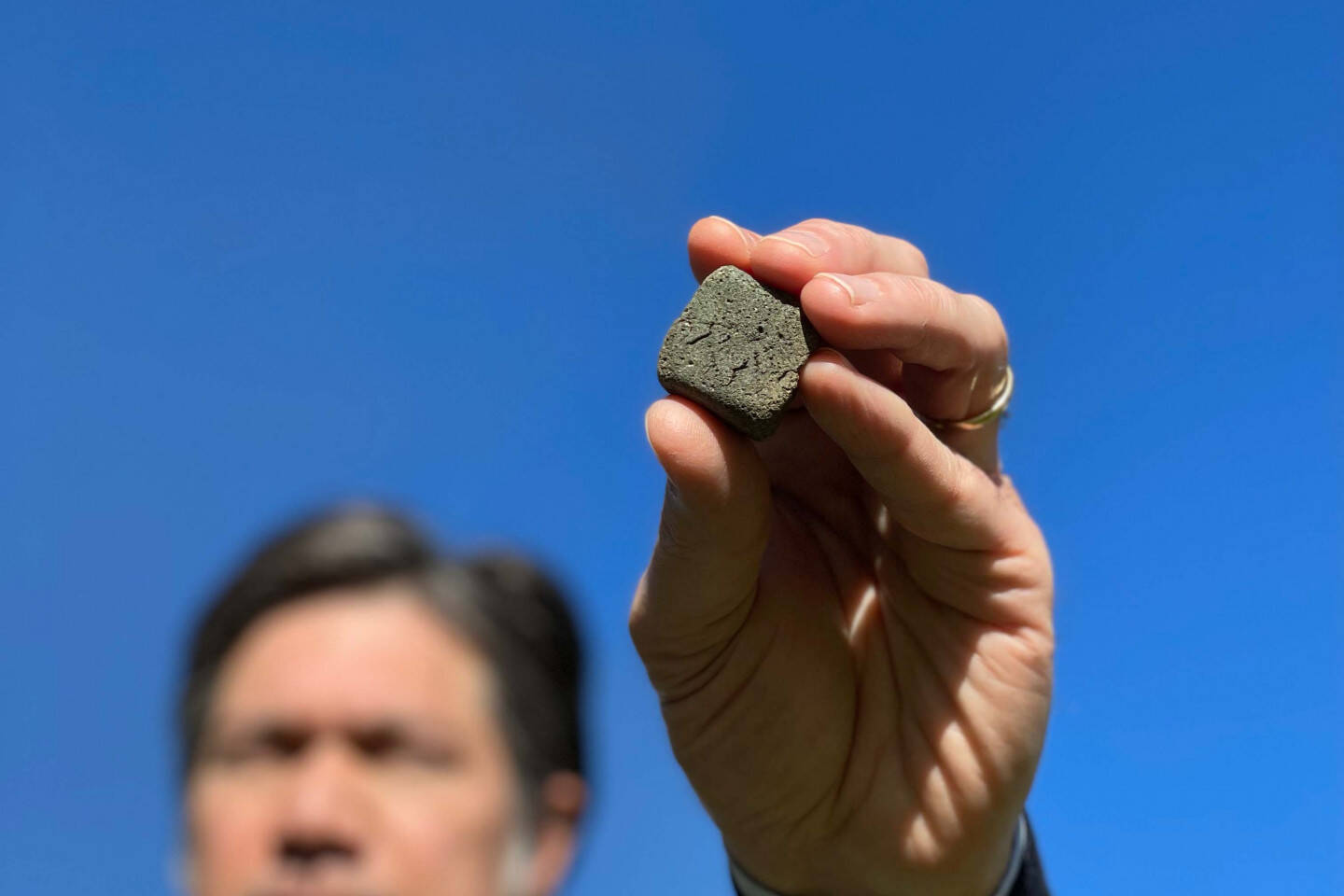Davide Zampini, CEMEX Head of Global R&D holding the world’s first solar clinker. Source CEMEX
