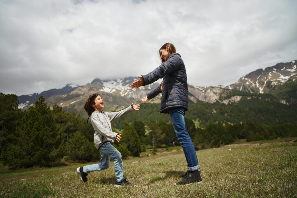Mother and son enjoying time together in the great outdoors. Image by jonas mohamadi on www.pexels.com