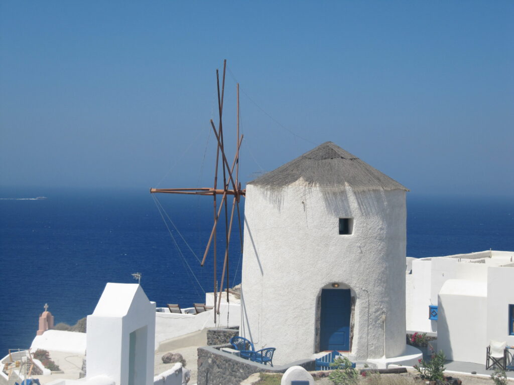 Glimpse of Oia, Santorini, Greece Image by Chris Sche-Bo