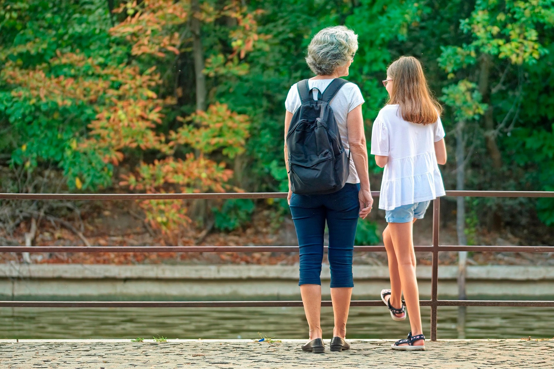 A grandmother and her granddaughter Image by Silviu on the street from Pixabay