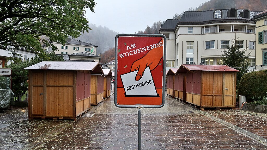 Sign announcing a voting weekend Image by Kecko, CC BY 2.0, via Wikimedia Commons